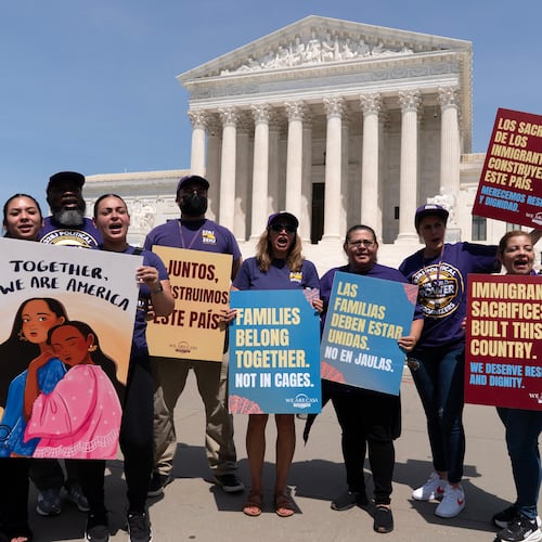 Activists celebrate the Supreme Court's birthright citizenship ruling outside of the Supreme Court on Capitol Hill, Tuesday, June 30, 2026, in Washington. (AP Photo/Jose Luis Magana)