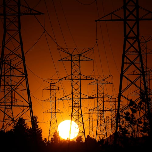 FILE - The sun sets behind high tension power lines, Monday, Sept. 23, 2024, in the Porter Ranch section of Los Angeles. (AP Photo/Mark J. Terrill, File)