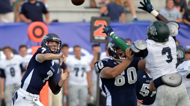 North Paulding quarterback Kyle Banks passes against Creekview in August. Banks later passed for 560 yards in a game against Harrison. KENT D. JOHNSON / KDJOHNSON@AJC.COM