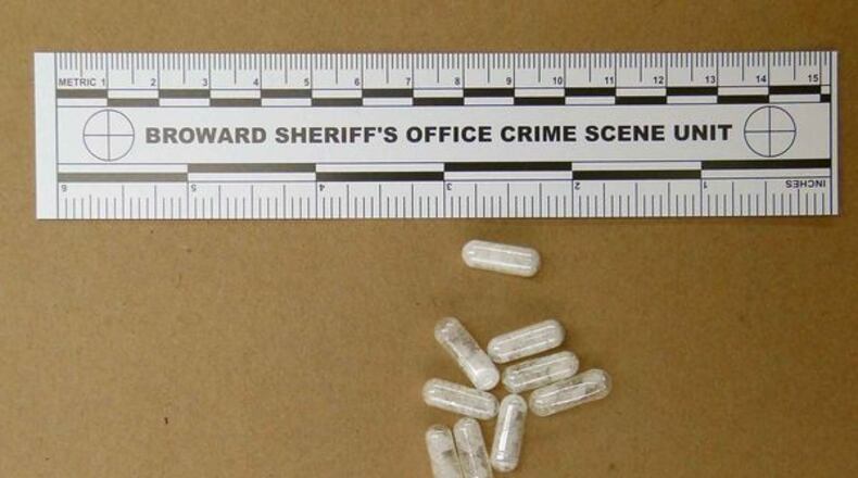 This Feb. 12, 2015 photo made available by the Broward Sheriff's Office, Fla., shows confiscated vials of flakka. This emerging drug can alter brain chemistry in such a way that users can't control their thoughts and it can increase adrenalin. (AP Photo/Broward Sheriff's Office via AP)