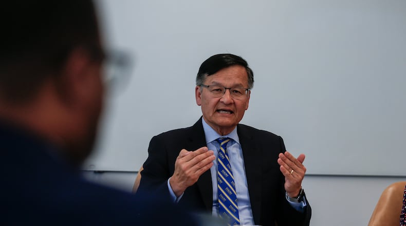Emory Healthcare CEO Dr. Joon Lee speaks at the AJC's June 12 editorial board meeting, where he revealed the hospital system started allocating money for pay increases back in March. Photo by Ziyu Julian Zhu / AJC