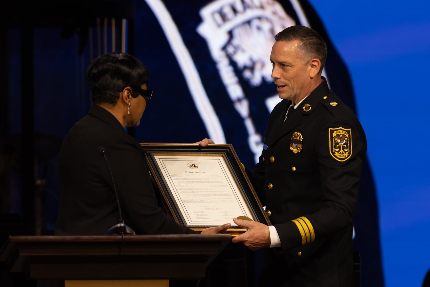 Flags fly at half-staff for slain DeKalb officer’s memorial service

