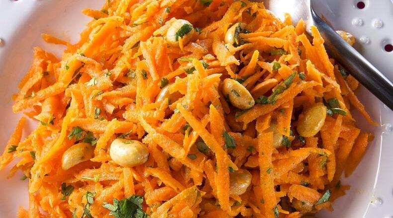 Cilantro Carrot Salad gets a super-spice boost from turmeric, which has anti-inflammatory properties. (Tammy Ljungblad/Kansas City Star/TNS)