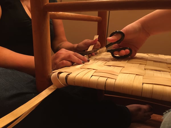 Former President Jimmy Carter asked two aides, Lauren Gay and Beth Davis, to recane a chair he'd made. (Courtesy of Sarah Reiff-Amsden)