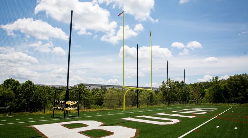 A new football field is just one of the amenities students and the community will enjoy at the new Buford High School. Students return to school on Wednesday, Aug. 7 when everyone except the littlest wolves will find themselves in new facilities. CASEY SIKES/FOR THE AJC