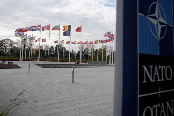FILE - A view of flags of NATO member countries, outside NATO headquarters in Brussels on Oct. 28, 2024. (AP Photo/Virginia Mayo, File)