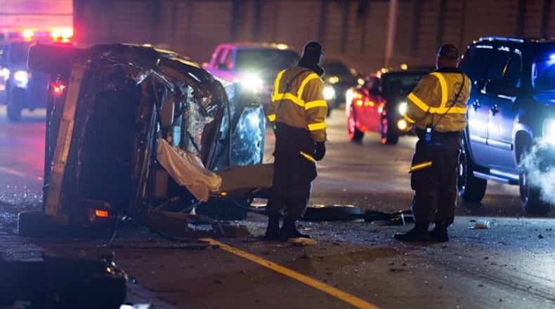 A fatal crash investigation shut down lanes on westbound I-20 at Gresham Road Friday in DeKalb County. BRANDEN CAMP / SPECIAL
