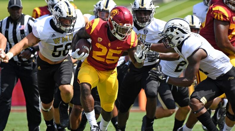 USC running back Ronald Jones (25) picks up big yards against the Western Michigan defense at the Los Angeles Memorial Coliseum on September 2, 2017. (Wally Skalij/Los Angeles Times/TNS)