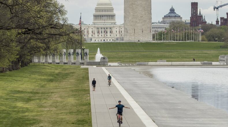 A federal stimulus package passed by Congress and signed by the president includes extra aid for small businesses to weather the coronavirus pandemic. On Monday and Tuesday the University of Georgia and the state of Georgia are offering webinars to help small business owners understand what aid is available and how to apply. (AP Photo/Andrew Harnik)