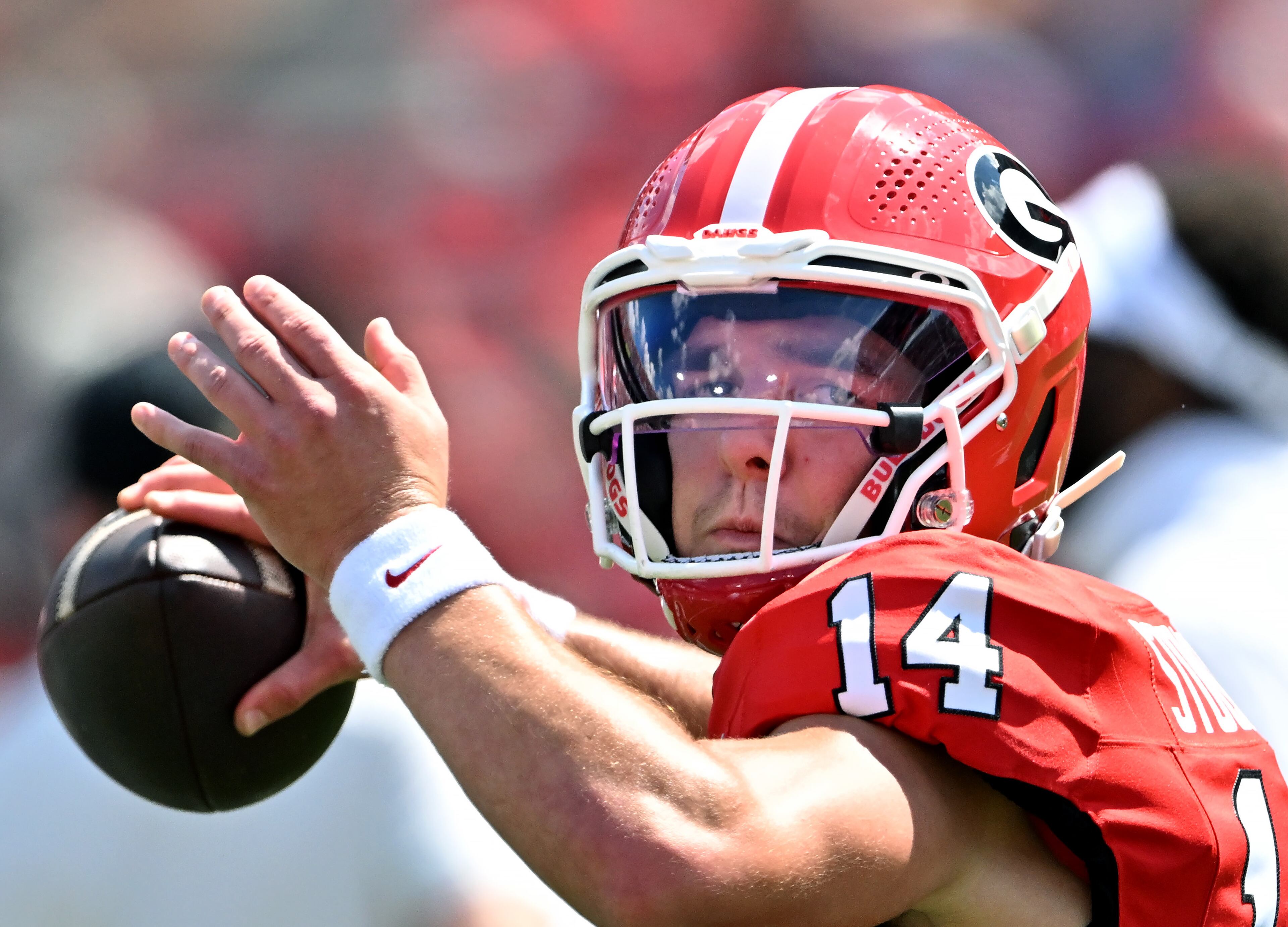 Georgia quarterback Gunner Stockton (14) warms up before Georgia football's season opener and home opener against Marshall at Sanford Stadium, Saturday, August 30, 2025, in Athens. (Hyosub Shin / AJC)