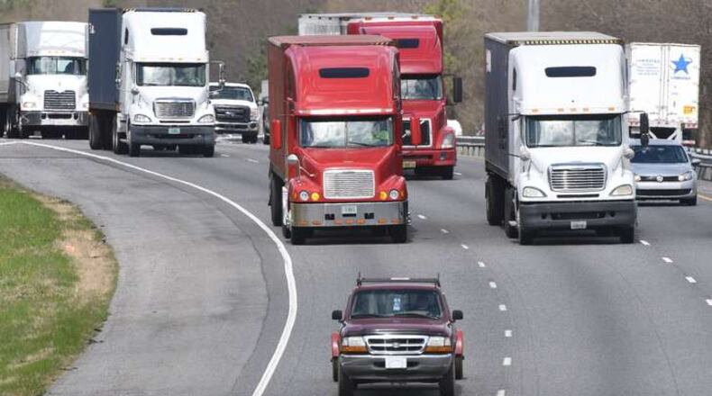 March 9, 2016 Jackson - Motorists, including many trucks, travel on I-75 northbound to Atlanta as seen from the Barnesville-Jackson Road overpass in Jackson. While metro Atlantans will have to pay to use the interstate capacity planned for I-75, I-285, Ga. 400, the new truck-only lanes proposed for I-75 between Macon and Atlanta will add new capacity at no cost to the freight industry. Mandatory, tolled truck-only lanes have been proposed in Georgia before, as part of a grander vision for the express toll lanes now being constructed along I-75 and I-575 in Cobb and Cherokee Counties. HYOSUB SHIN / HSHIN@AJC.COM