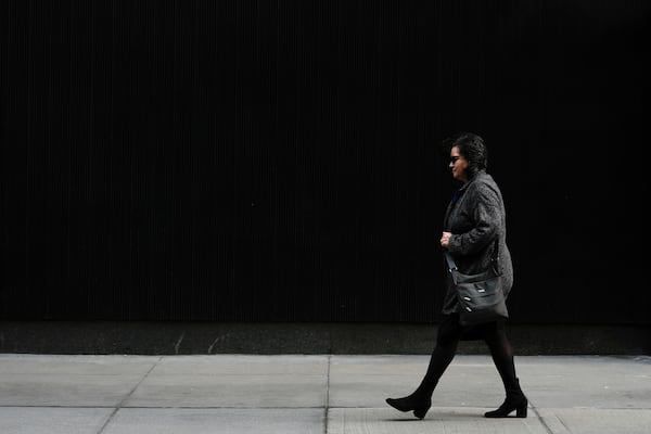 FILE - Karen Ortiz, an administrative judge at the Equal Employment Opportunity Commission, walks to her office, Wednesday, Feb. 26, 2025, in New York. (AP Photo/Julia Demaree Nikhinson,File)