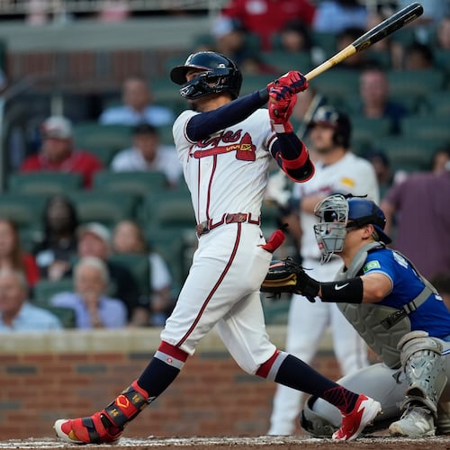 Atlanta Braves' Mauricio Dubón hits a three-run homer in the third inning of a baseball game against the Toronto Blue Jays, Wednesday, June 3, 2026, in Atlanta. (AP Photo/Mike Stewart)