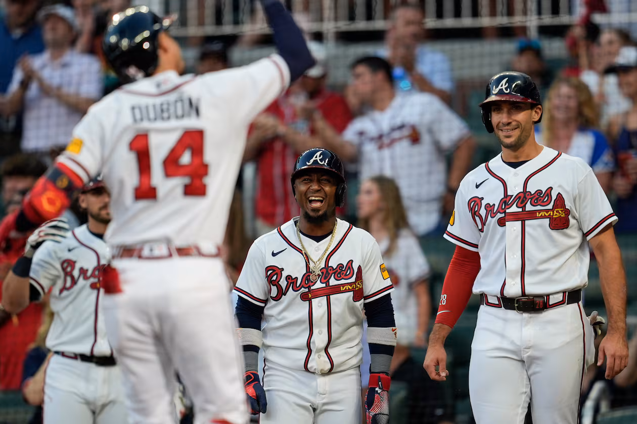 Atlanta Braves' Mauricio Dubón celebrates with teammates after hitting a three-run homer in the third inning of a baseball game against the Toronto Blue Jays, Wednesday, June 3, 2026, in Atlanta. (AP Photo/Mike Stewart)
