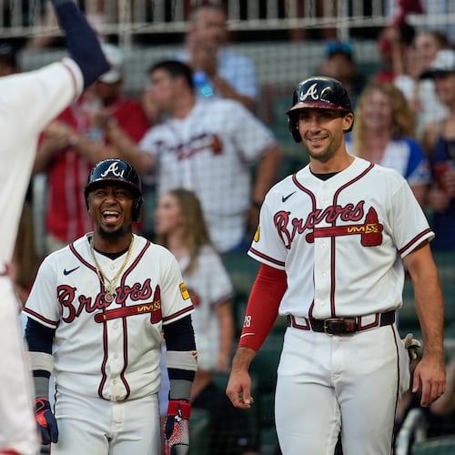 Atlanta Braves' Mauricio Dubón celebrates with teammates after hitting a three-run homer in the third inning of a baseball game against the Toronto Blue Jays, Wednesday, June 3, 2026, in Atlanta. (AP Photo/Mike Stewart)