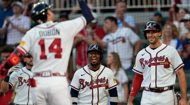 Atlanta Braves' Mauricio Dubón celebrates with teammates after hitting a three-run homer in the third inning of a baseball game against the Toronto Blue Jays, Wednesday, June 3, 2026, in Atlanta. (AP Photo/Mike Stewart)