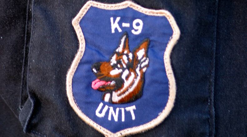 Those flipping through the Bryant High School yearbook may be surprised to see a furry face pictured among the faculty, staff and students: It's Mya, the K-9 school resource officer.