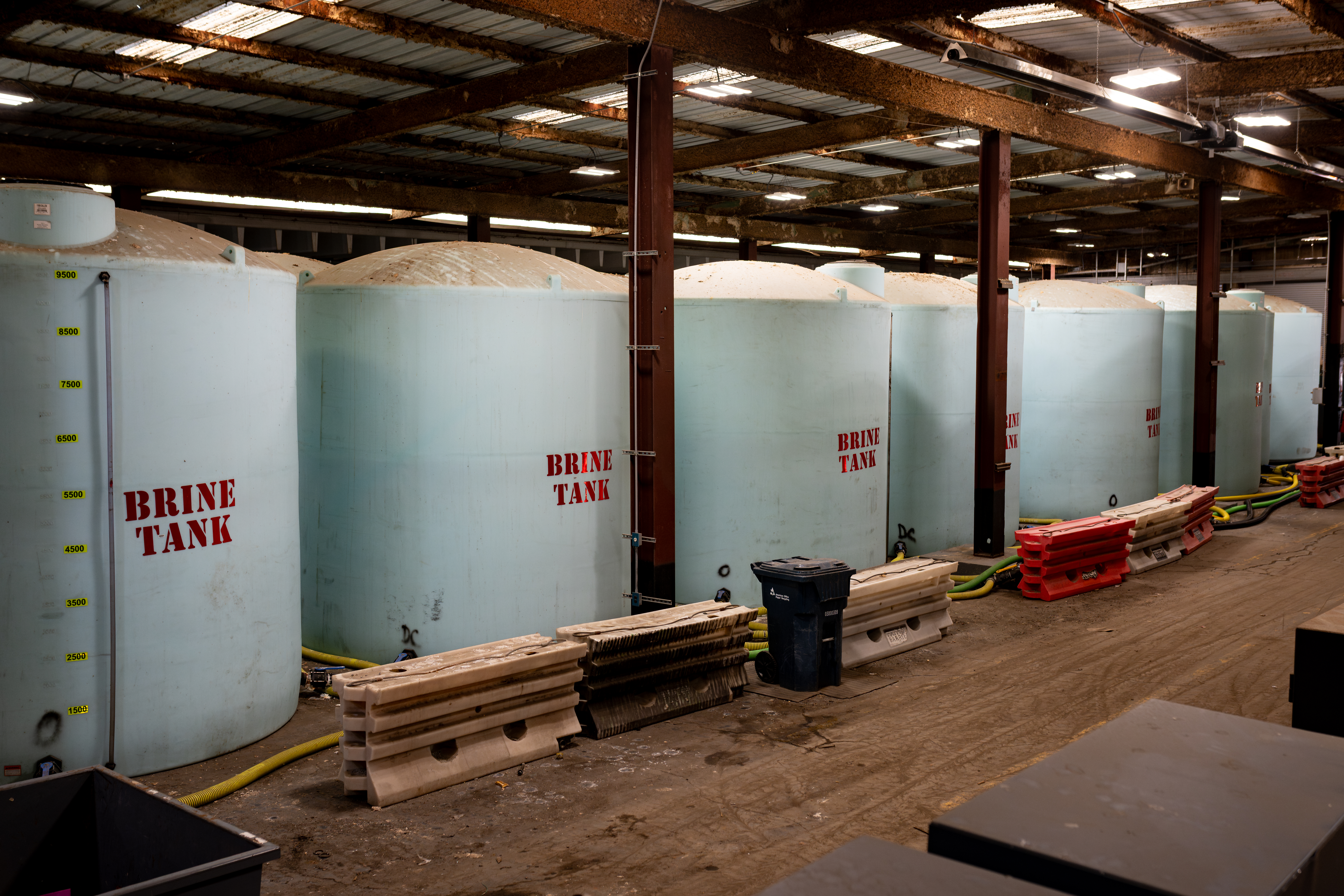 Brine used to treat the state's roads are stored in tanks at the Georgia Department of Transportation facility in Forest Park. (Ben Hendren for the AJC)