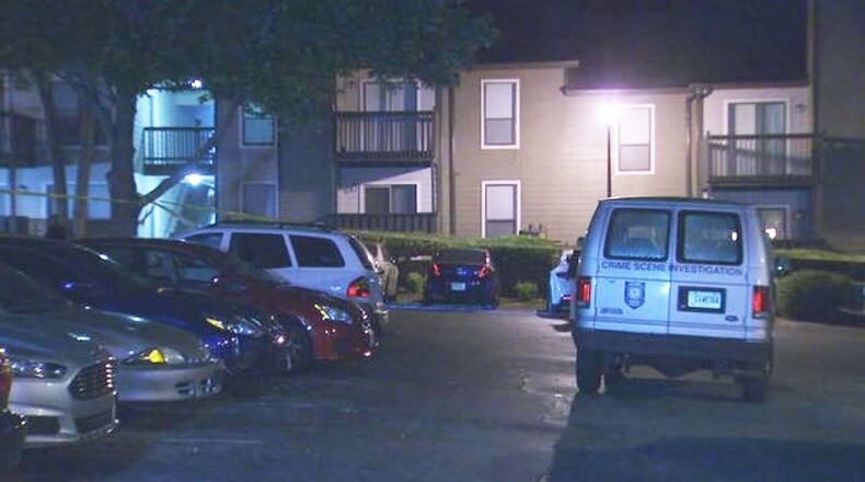 A woman was shot to death at an apartment complex in the 2000 block of Woodcrest Walk in DeKalb County.