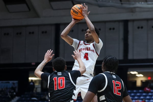Woodward Academy guard Jarvis Hayes Jr. attempts a three-point shot during the second half against Tri-Cities in the GHSA Boys 5A State Championship at the Macon Centreplex, Friday, March, 7, 2025, in Macon, Ga. Tri-Cities won 66-55. (Jason Getz/AJC)