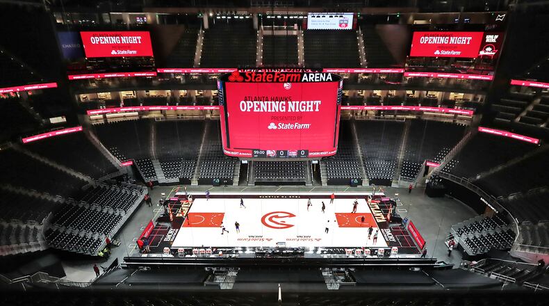 122820 ATLANTA: State Farm Arena is mostly empty as the Atlanta Hawks prepare to play the Detroit Pistons in their home opener NBA basketball game on Monday, Dec. 28, 2020, in Atlanta. “Curtis Compton / Curtis.Compton@ajc.com”