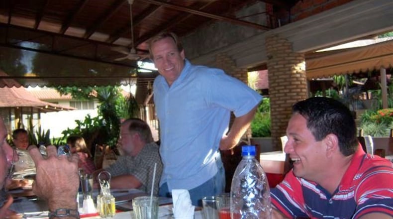 Aubrey Lee Price, center, the South Georgia bank director and investment adviser accused of defrauding his bank and clients, is seen here in Acarigua, Venezuela in 2009. PHOTO CREDIT RICK SMITH.