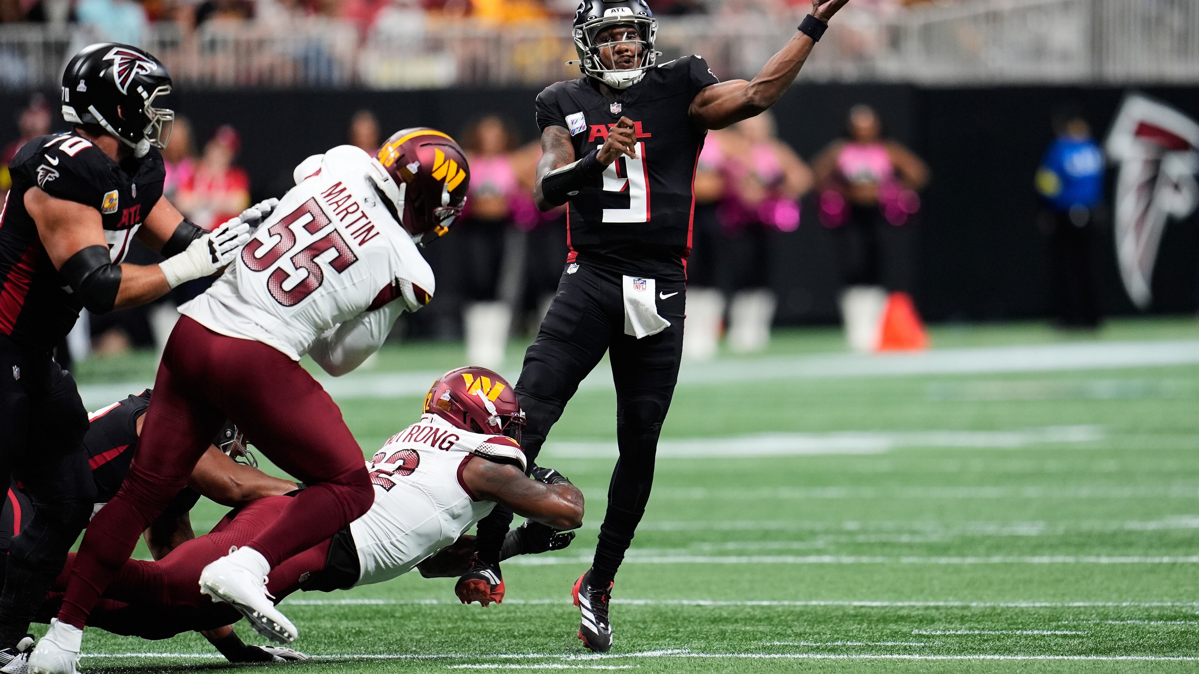 Atlanta Falcons quarterback Michael Penix Jr. (9) throws against the Washington Commanders during the first half of an NFL football game, Sunday, Sept. 28, 2025, in Atlanta. (AP Photo/Mike Stewart)