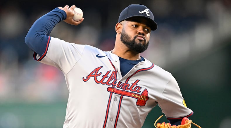 Atlanta Braves starting pitcher Reynaldo Lopez throws during the first inning of a baseball game against the Washington Nationals, Tuesday, Sept. 10, 2024, in Washington. (AP Photo/John McDonnell)