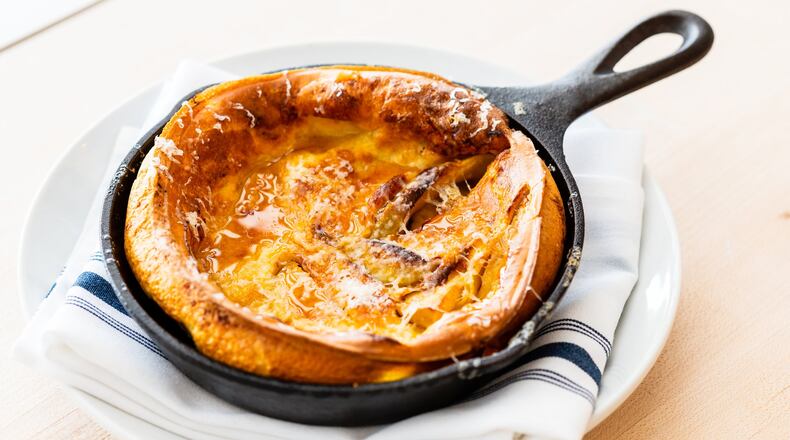 The Dutch Baby pancake at Pancake Social is made with apples and Gruyere. CONTRIBUTED BY HENRI HOLLIS