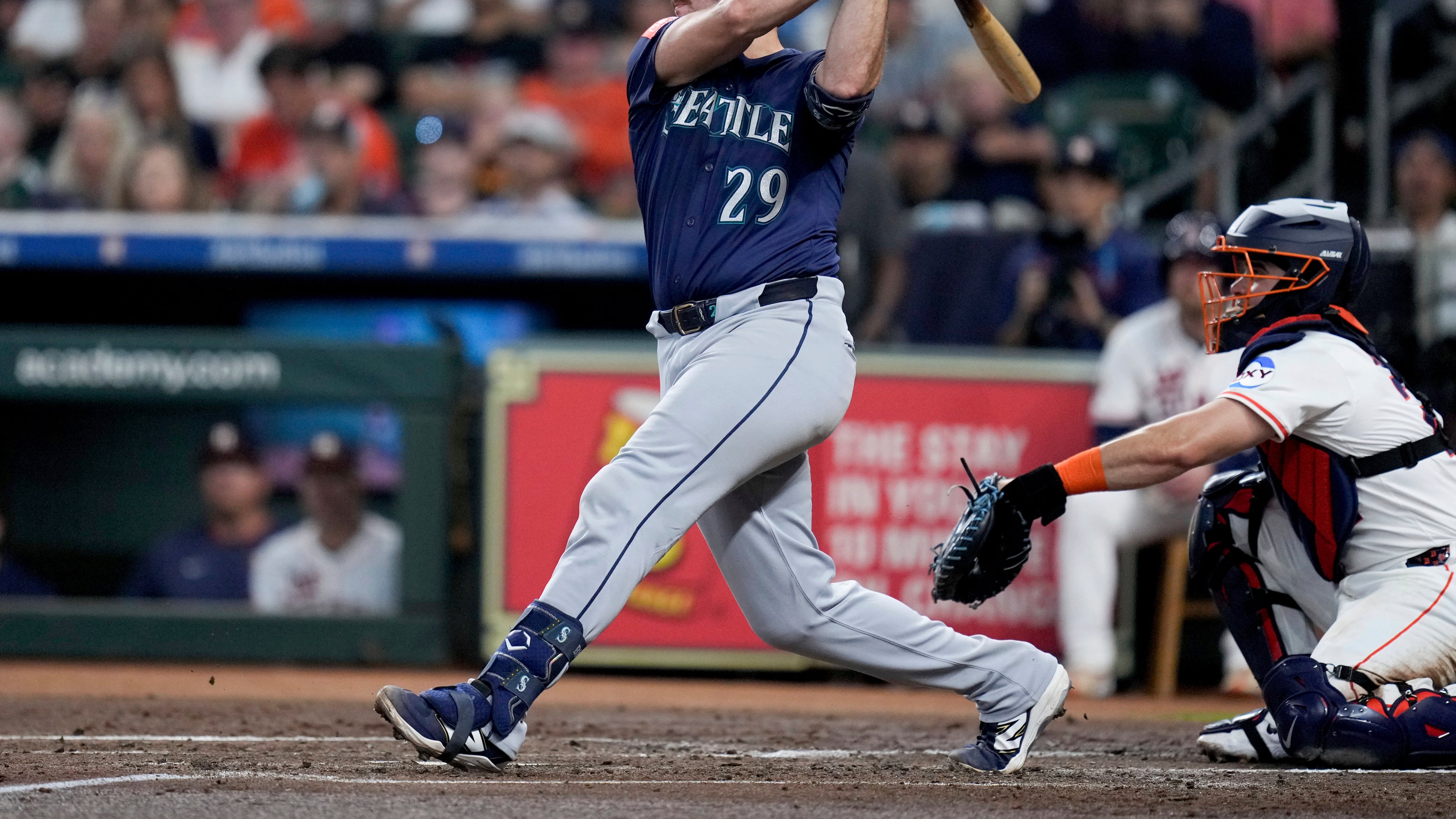 Seattle Mariners' Cal Raleigh (29) hits a solo home run, his 57th of the season, against the Houston Astros during the third inning of a baseball game Saturday, Sept. 20, 2025, in Houston. (AP Photo/Eric Christian Smith)