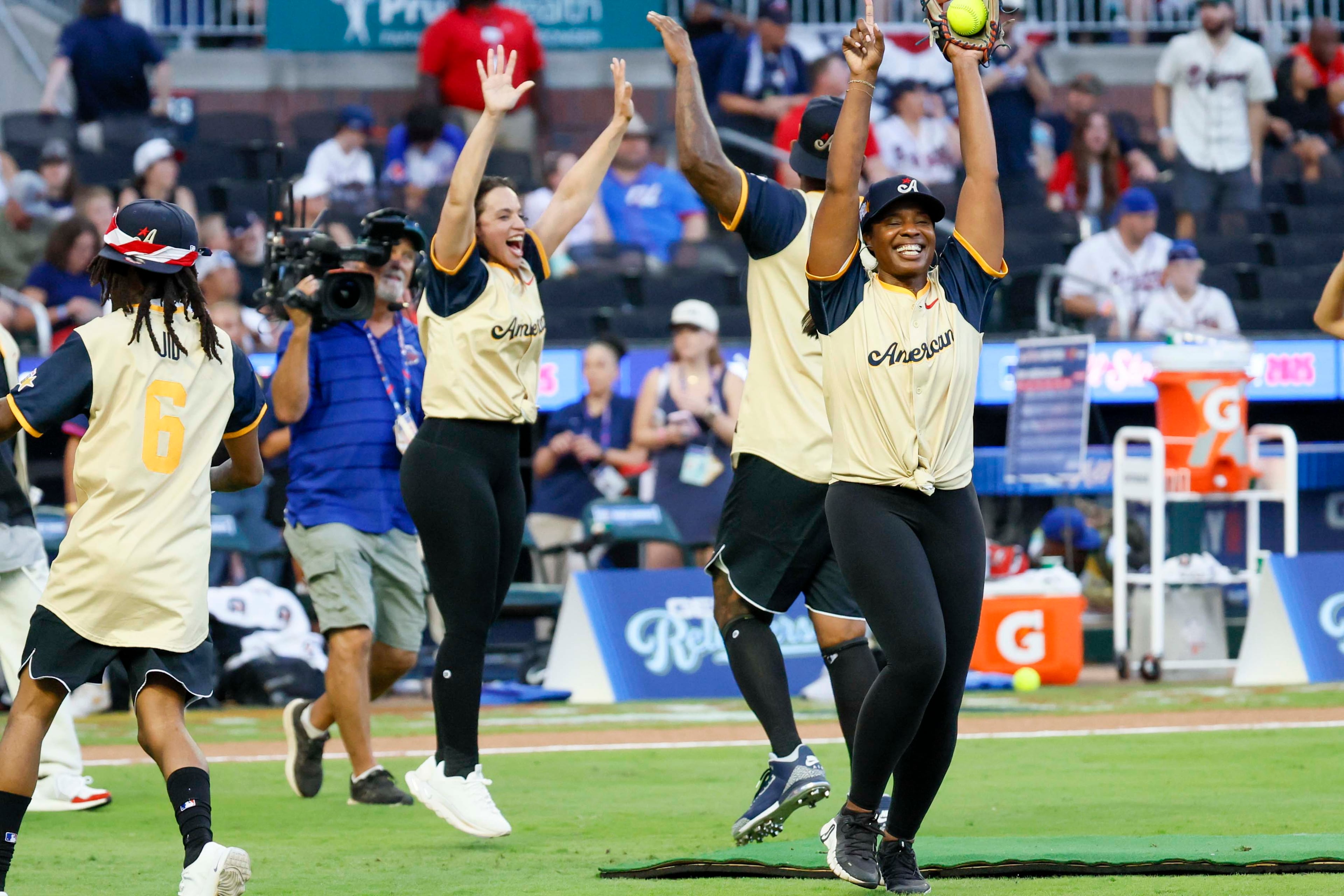 American League celebrities celebrate after winning against the National League celebrities during the MLB All-Star Celebrity Game at Truist Park on Saturday, July 12, 2025, in Atlanta.
(Miguel Martinez/ AJC)
