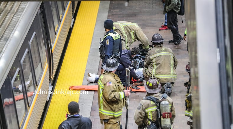 MARTA reported minor delays Thursday morning as crews worked to remove a man from the eastbound track at the Georgia World Congress Center/CNN Center station.