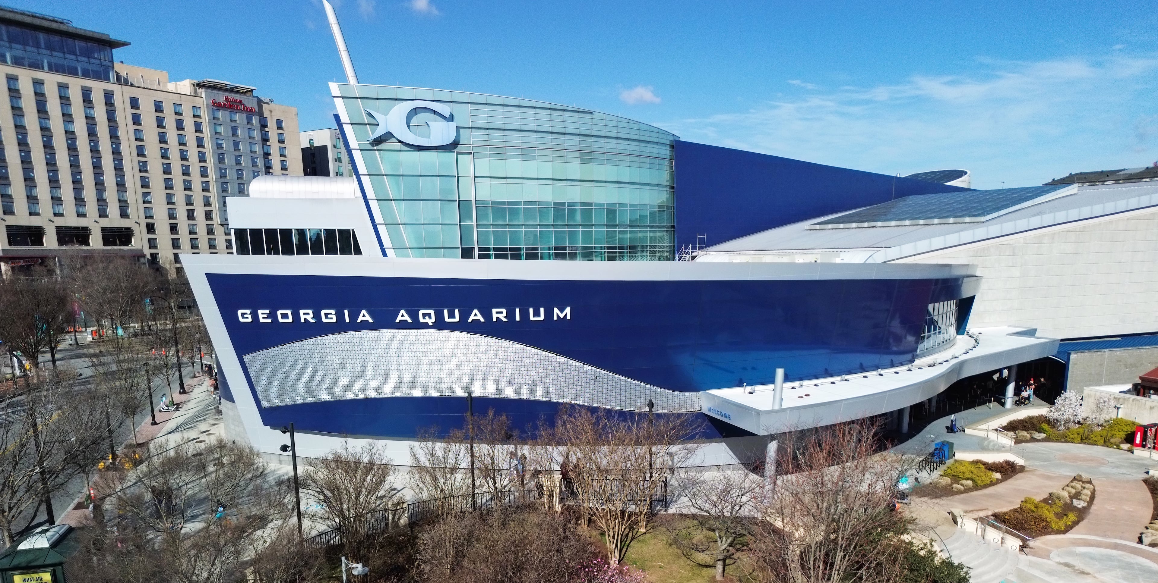 Georgia Aquarium opened in November 2005 as the largest aquarium in the world. It was built on a plot of land next to Centennial Olympic Park that was donated by the Coca-Cola Company.