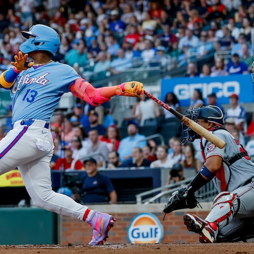 Atlanta Braves' Ronald Acuña Jr. (13) hits a solo home run against the Washington Nationals during the first inning of a baseball game, Saturday, Aug. 1, 2026, in Atlanta. (AP Photo/Erik S. Lesser)