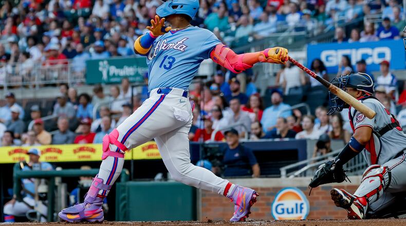 Atlanta Braves' Ronald Acuña Jr. (13) hits a solo home run against the Washington Nationals during the first inning of a baseball game, Saturday, Aug. 1, 2026, in Atlanta. (AP Photo/Erik S. Lesser)