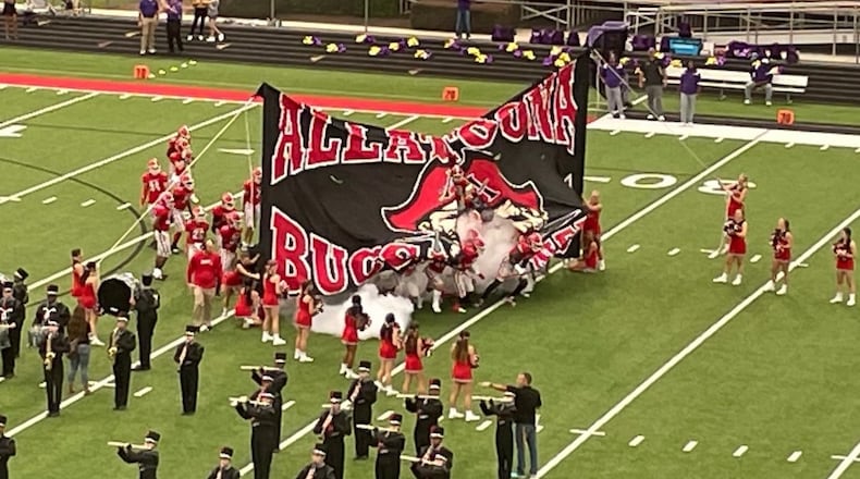 Allatoona players take the field for their game against Cartersville in Acworth on Sept. 2, 2022. Cartersville rallied from a 20-0 deficit to win 28-20.