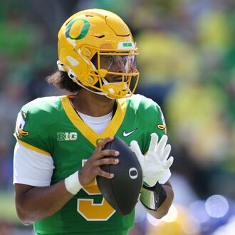 Oregon quarterback Dante Moore (5) looks to pass during the first half of an NCAA college football game against Boise State, Saturday, Sept. 5, 2026, in Eugene, Ore. (AP Photo/Lydia Ely)