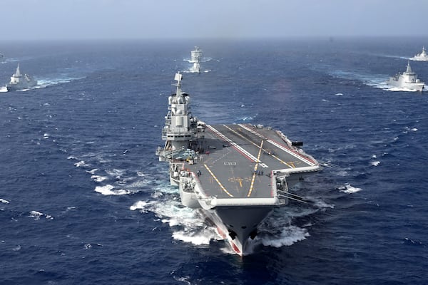 FILE - In this photo released by Xinhua News Agency, conventionally powered Chinese aircraft carrier Liaoning carries out a dual aircraft carrier formation exercise with the Shandong aircraft carrier, unseen, for the first time in the South China Sea in late October 2024. (Pu Haiyang/Xinhua via AP,File)
