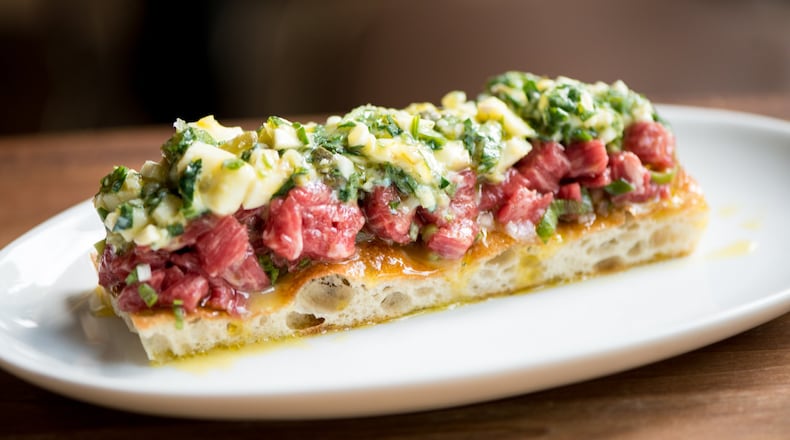 The Deer and the Dove tartare features rare beef, soft boiled gribiche, focaccia and olive oil. CONTRIBUTED BY MIA YAKEL