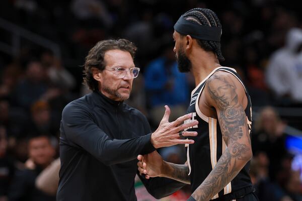 Hawks coach Quin Snyder (left) has managed a revamped roster, included Nickeil Alexander-Walker, who was an offseason addition in free agency. (Jason Getz/AJC)