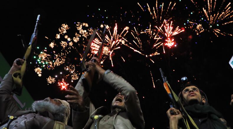 Fireworks burst as Houthi supporters rally against the Saudi-led coalition in Sanaa, Yemen, Monday, July 20, 2026. (AP Photo/Osamah Abdulrahman)