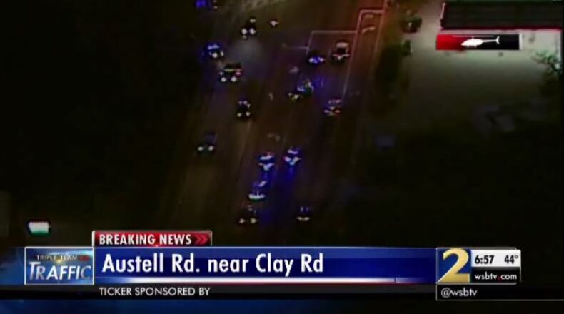 A fatal crash investigation shut down all but one lane on Austell Road Wednesday near Clay Road. (Credit: Channel 2 Action News)