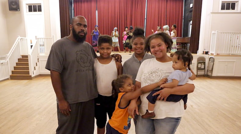 Christan Theresa Poret and her family, (from left), husband Mark Poret, son Sean, 10, son Cameren (cq) 4, daughter Meah (cq) 13, and son Jaydn (cq) 15-months, at the Clarkston Community Center on Thursday, August 24, 2017. Poret relocated to Atlanta from New Orleans during hurricane Katrina. (Akili-Casundria Ramsess/Special to the AJC)