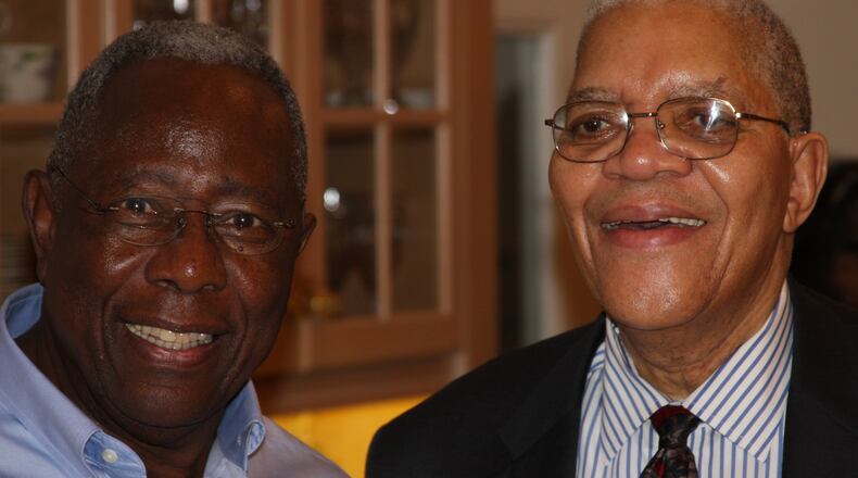Baseball Hall of Famer Hank Aaron and Samuel DuBois Cook celebrated the release of Cook's latest book in March 2010 at a party at the slugger’s home.