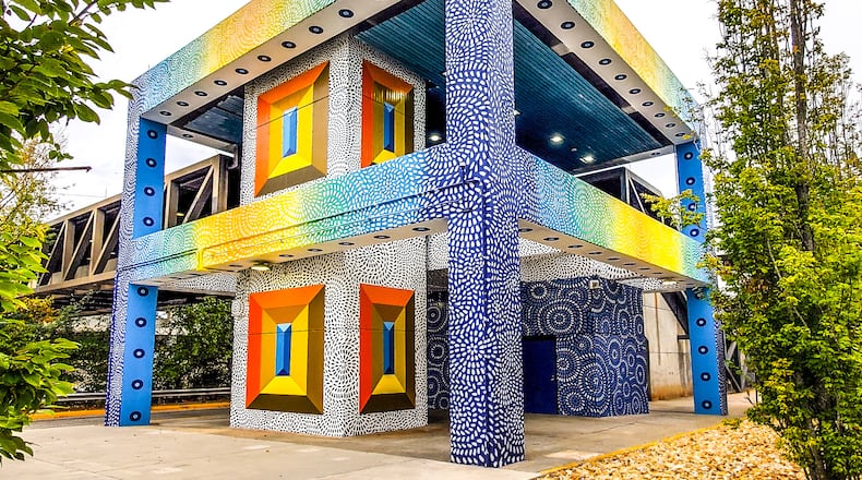 The colorful mural on the Edgewood-Candler Park MARTA station by Milagros Collective has recast a cold concrete entryway into one that packs visual pizzazz. (Arthur Rudick/Courtesy of ArtsATL)