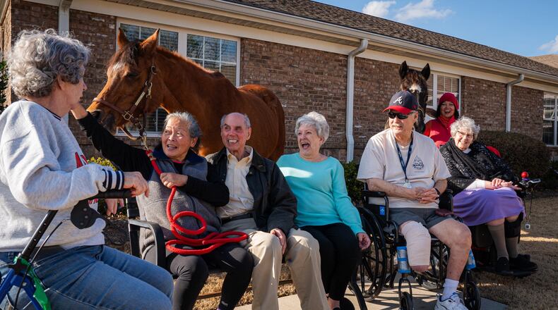 Seniors from Addington Place Assisted Living & Memory Care participate in a therapy session in Joyous Acres’ Seniors for Seniors program. (Courtesy of Joyous Acres)