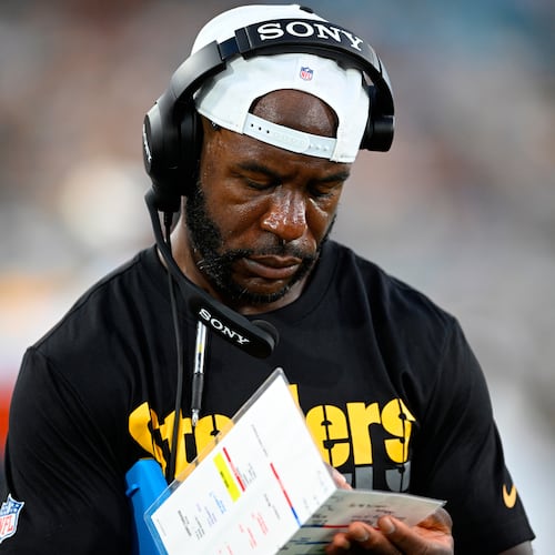 FILE - Then-Pittsburgh Steelers defensive backs coach Gerald Alexander writes down notes on the sideline during the first half of an NFL preseason football game against the Jacksonville Jaguars, Aug. 9, 2025, in Jacksonville, Fla. (AP Photo/Phelan M. Ebenhack, File)