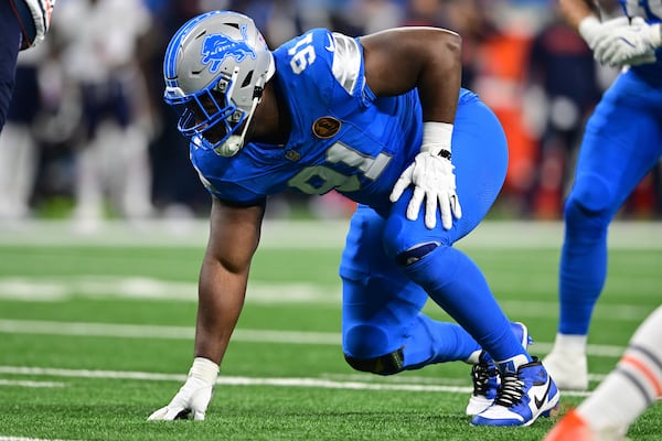 FILE - Detroit Lions defensive end Levi Onwuzurike waits for the snap of the ball during the first half of an NFL football game against the Chicago Bears in Detroit, Nov. 28, 2024. (AP Photo/David Dermer, file)