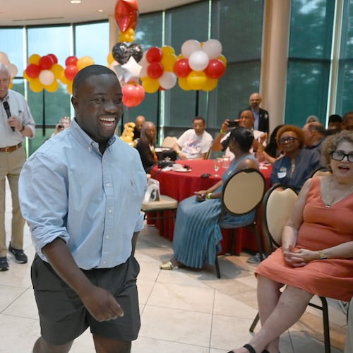 Adrian Boafo, a Maryland state delegate and candidate for U.S. Congress walks into the crowd after being introduced by Congressman Steny Hoyer, left, at the "AmeriPac Bull Roast" Friday, June 12, 2026, in Mitchellville, Md. (AP Photo/Gail Burton)