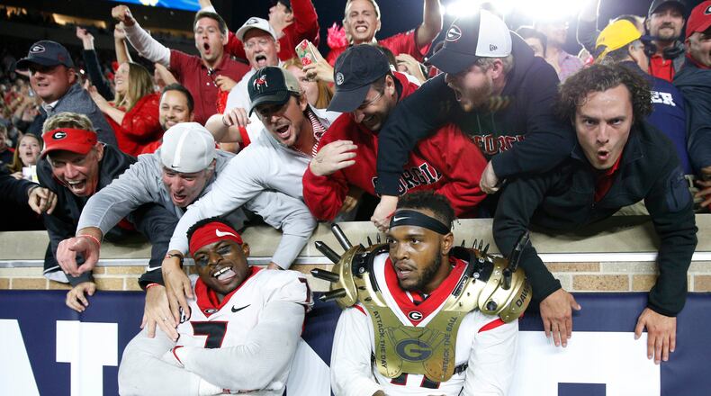 SOUTH BEND, IN - SEPTEMBER 09: Davin Bellamy #17 and Lorenzo Carter #7 of the Georgia Bulldogs celebrate after a 20-19 win against the Notre Dame Fighting Irish at Notre Dame Stadium on September 9, 2017 in South Bend, Indiana. (Photo by Joe Robbins/Getty Images)